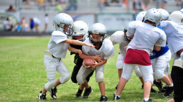Youth football coaches have to make game day decisions to help their Pop Warner team too.